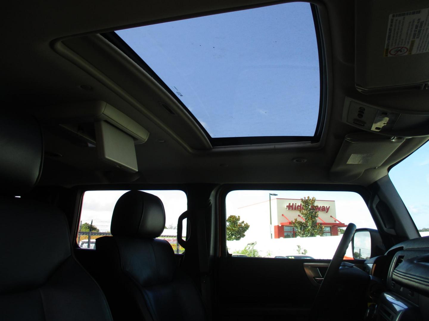 2008 Orange /Black HUMMER H2 Base (5GRGN23868H) with an 6.2L V8 OHV 16V engine, 6-Speed Automatic Overdrive transmission, located at 4724 53rd Ave East, Suite 1, Bradenton, FL, 34203, (941) 803-7117, 27.445360, -82.501678 - Photo#14