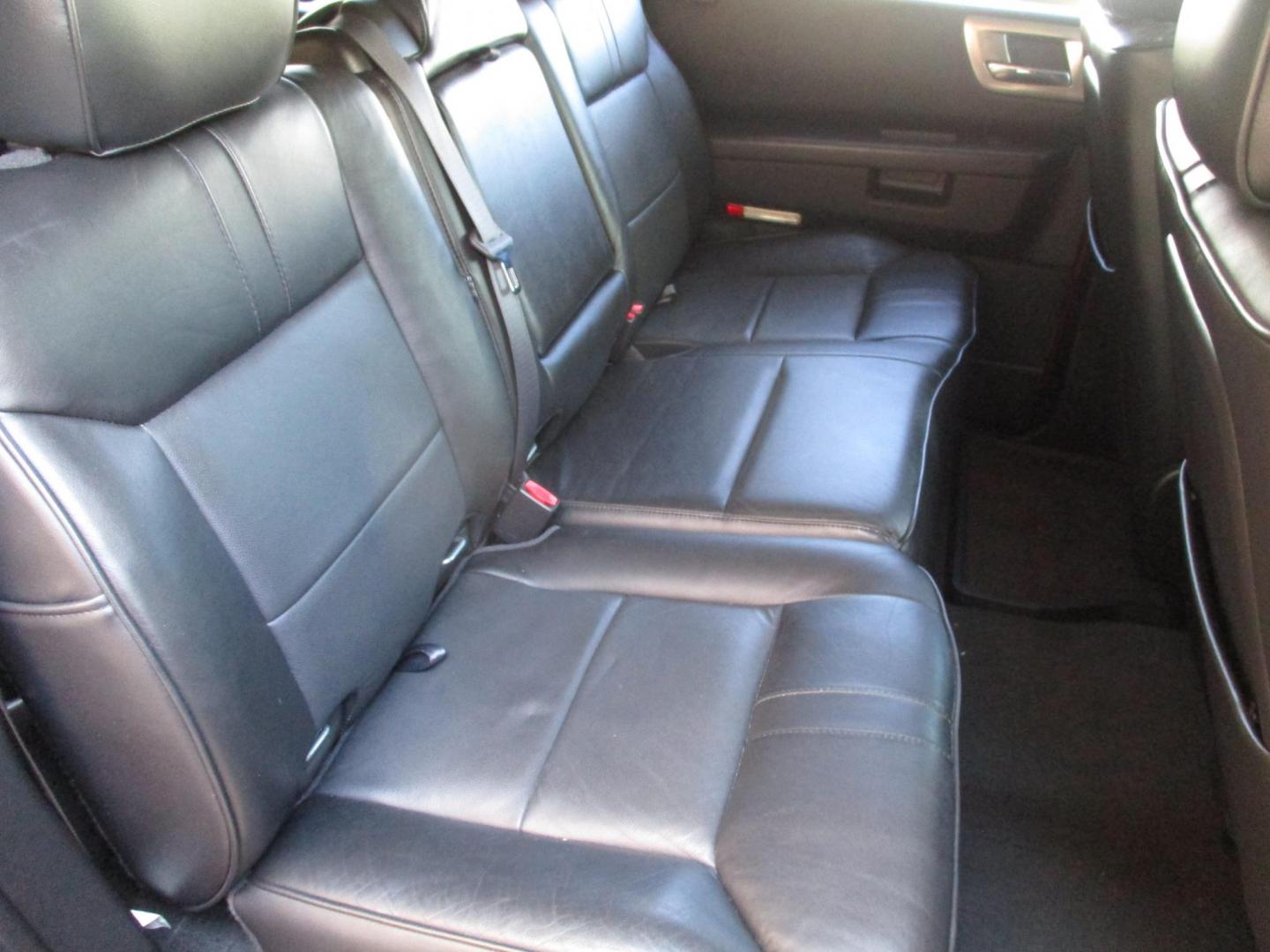 2008 Orange /Black HUMMER H2 Base (5GRGN23868H) with an 6.2L V8 OHV 16V engine, 6-Speed Automatic Overdrive transmission, located at 4724 53rd Ave East, Suite 1, Bradenton, FL, 34203, (941) 803-7117, 27.445360, -82.501678 - Photo#16