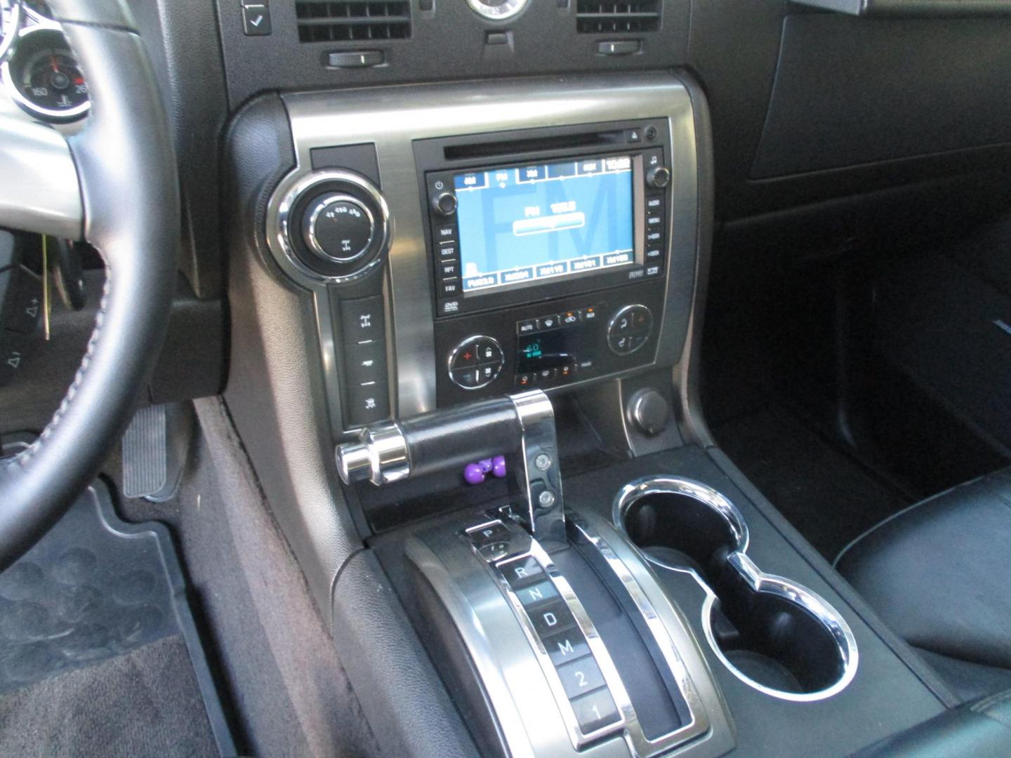 2008 Orange /Black HUMMER H2 Base (5GRGN23868H) with an 6.2L V8 OHV 16V engine, 6-Speed Automatic Overdrive transmission, located at 4724 53rd Ave East, Suite 1, Bradenton, FL, 34203, (941) 803-7117, 27.445360, -82.501678 - Photo#18
