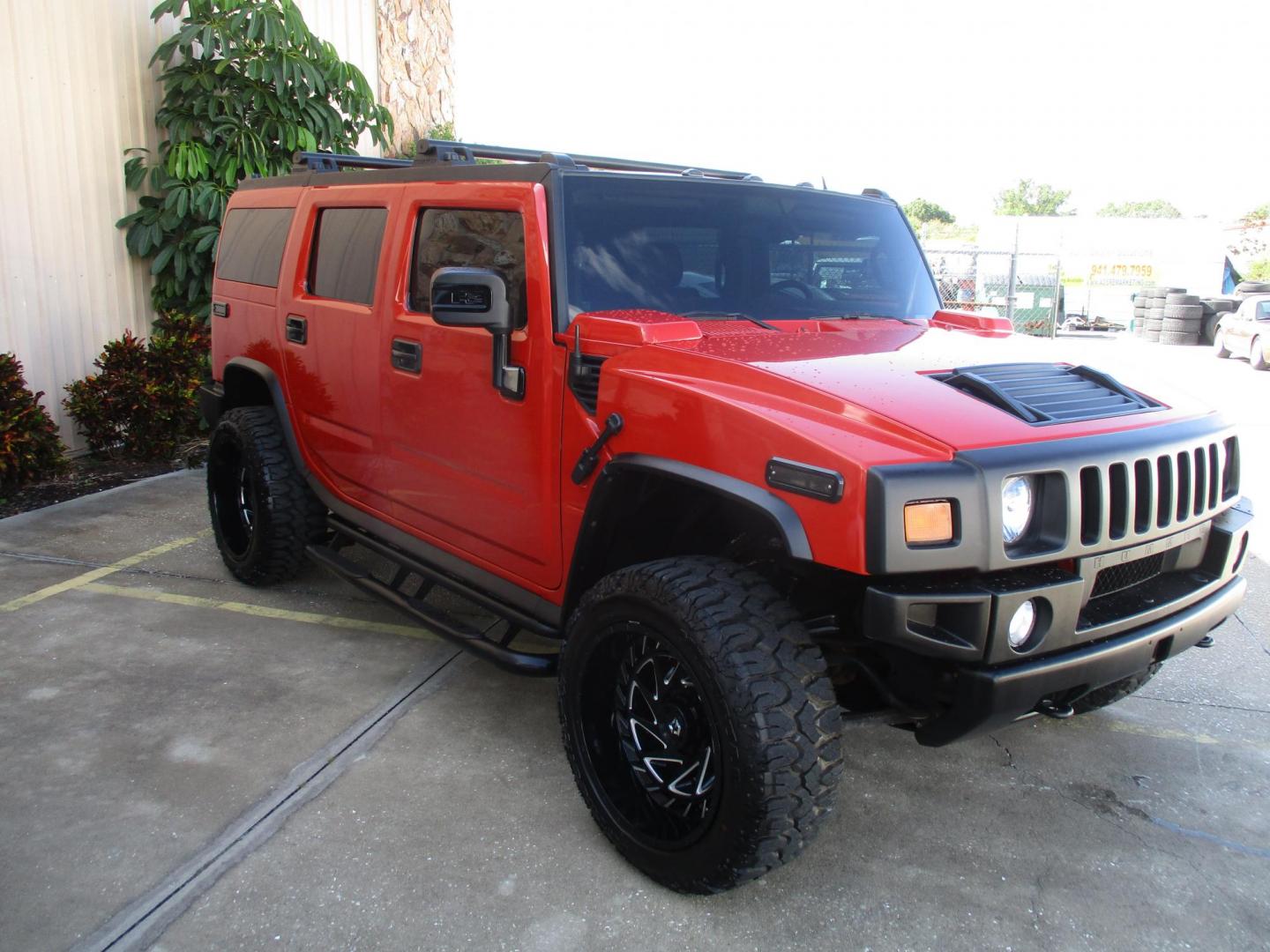 2008 Orange /Black HUMMER H2 Base (5GRGN23868H) with an 6.2L V8 OHV 16V engine, 6-Speed Automatic Overdrive transmission, located at 4724 53rd Ave East, Suite 1, Bradenton, FL, 34203, (941) 803-7117, 27.445360, -82.501678 - Photo#2