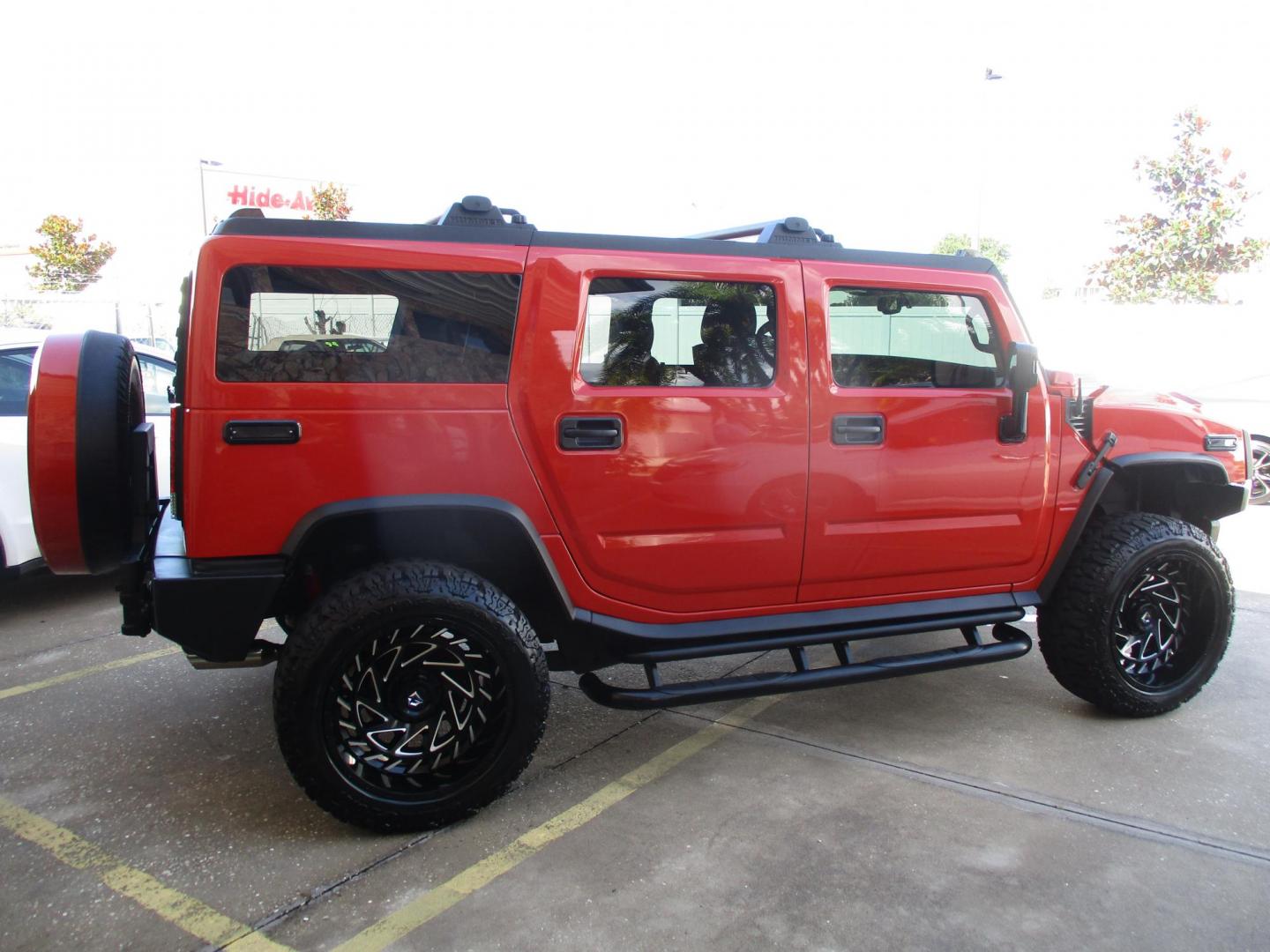 2008 Orange /Black HUMMER H2 Base (5GRGN23868H) with an 6.2L V8 OHV 16V engine, 6-Speed Automatic Overdrive transmission, located at 4724 53rd Ave East, Suite 1, Bradenton, FL, 34203, (941) 803-7117, 27.445360, -82.501678 - Photo#3