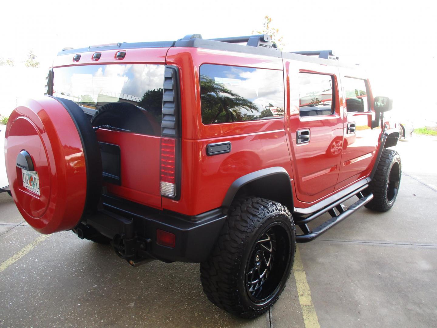 2008 Orange /Black HUMMER H2 Base (5GRGN23868H) with an 6.2L V8 OHV 16V engine, 6-Speed Automatic Overdrive transmission, located at 4724 53rd Ave East, Suite 1, Bradenton, FL, 34203, (941) 803-7117, 27.445360, -82.501678 - Photo#4