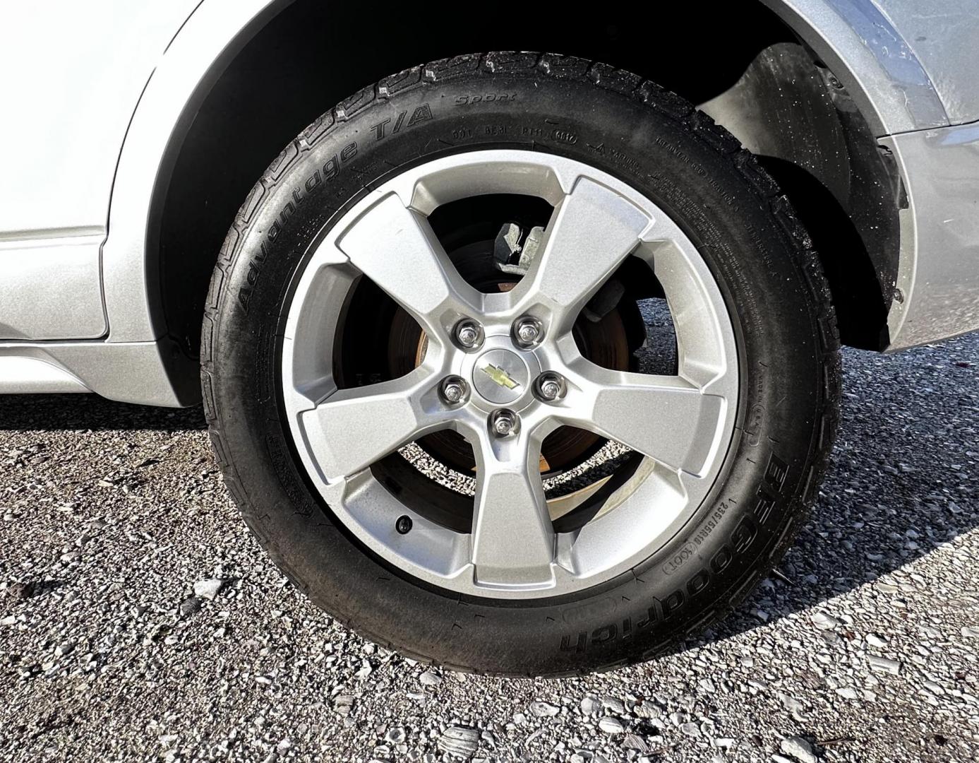 2013 Silver Chevrolet Captiva Sport Fleet LTZ FWD (3GNAL4EK0DS) with an 2.4L L4 DOHC 16V FFV engine, 6-Speed Automatic transmission, located at 4724 53rd Ave East, Suite 1, Bradenton, FL, 34203, (941) 803-7117, 27.445360, -82.501678 - Photo#8