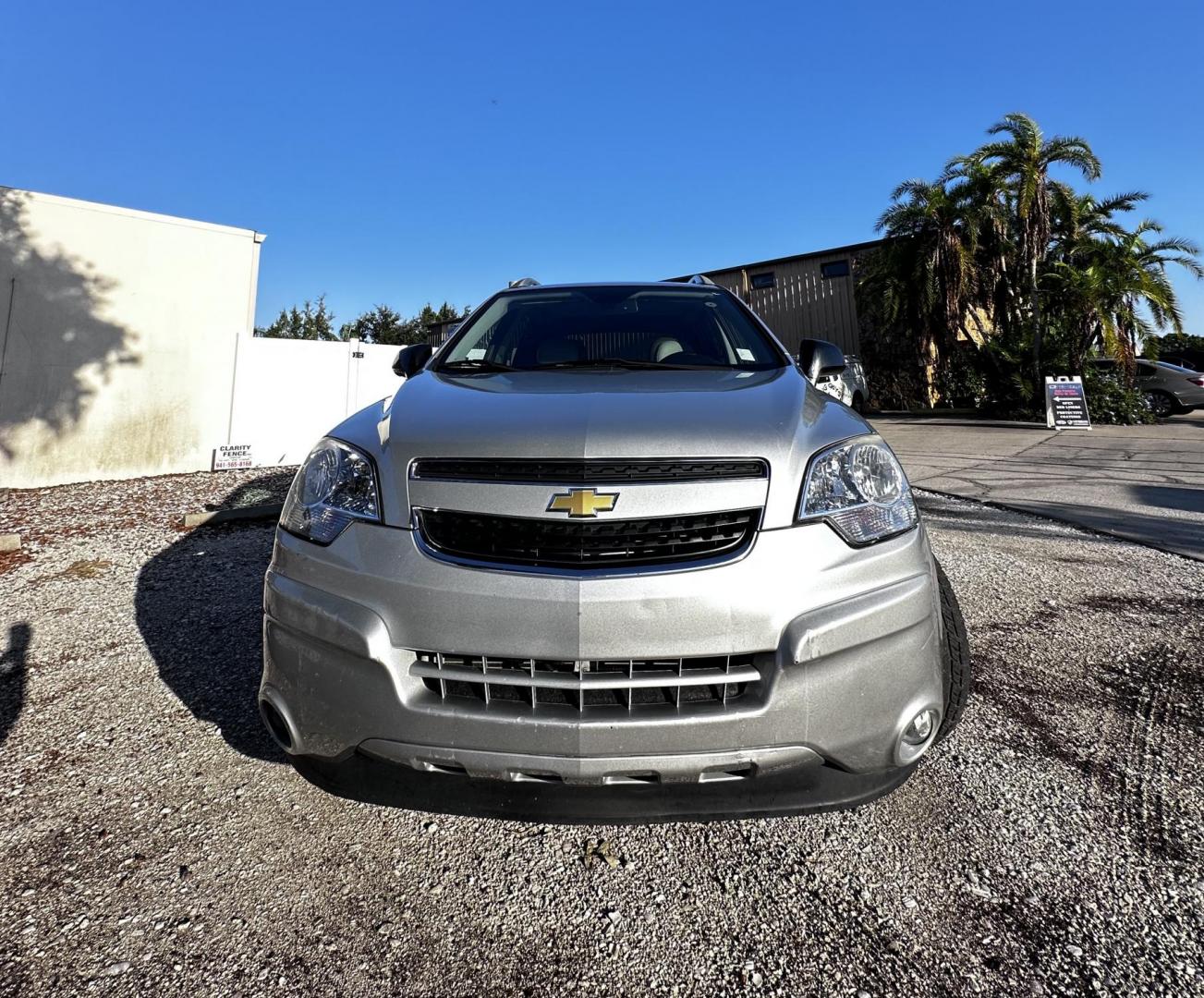 2013 Silver Chevrolet Captiva Sport Fleet LTZ FWD (3GNAL4EK0DS) with an 2.4L L4 DOHC 16V FFV engine, 6-Speed Automatic transmission, located at 4724 53rd Ave East, Suite 1, Bradenton, FL, 34203, (941) 803-7117, 27.445360, -82.501678 - Photo#2