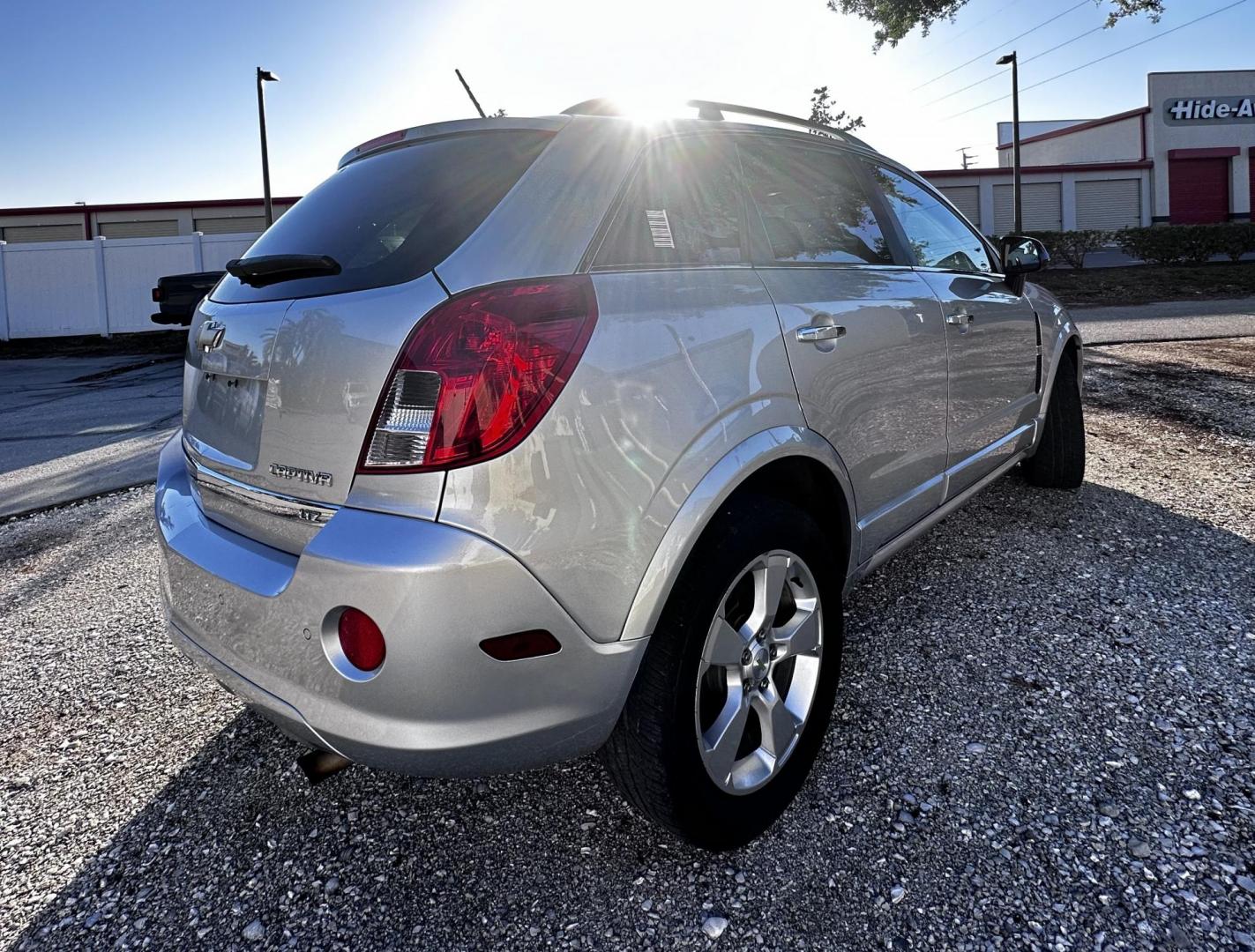2013 Silver Chevrolet Captiva Sport Fleet LTZ FWD (3GNAL4EK0DS) with an 2.4L L4 DOHC 16V FFV engine, 6-Speed Automatic transmission, located at 4724 53rd Ave East, Suite 1, Bradenton, FL, 34203, (941) 803-7117, 27.445360, -82.501678 - Photo#5